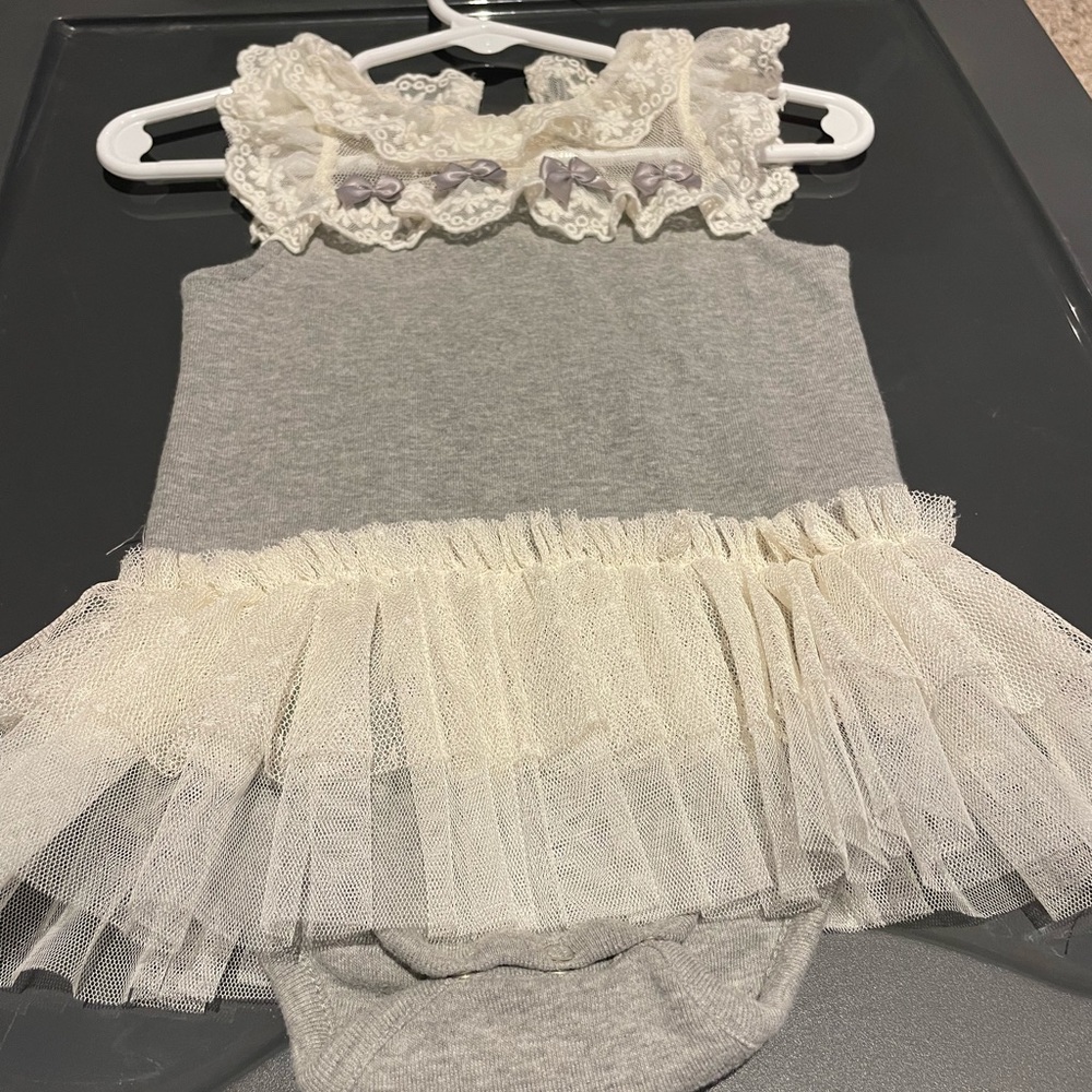 EUC 3/6 mo boutique onesie/skirt.